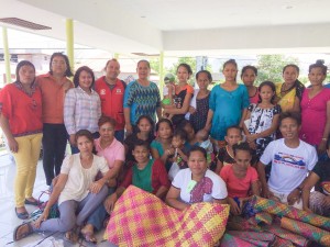 DSWD staffs with the Bajau participants and their finish products