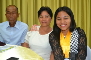 Charmaine T. Nonay with her parents.